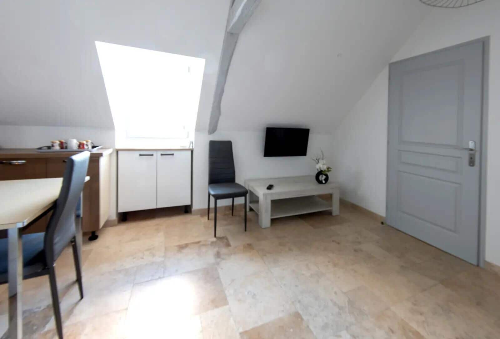 Comfort Apartment (Cajarc) | Living area | Flat-screen TV