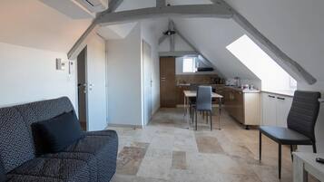 Comfort Apartment (Cajarc) | Living area | Flat-screen TV