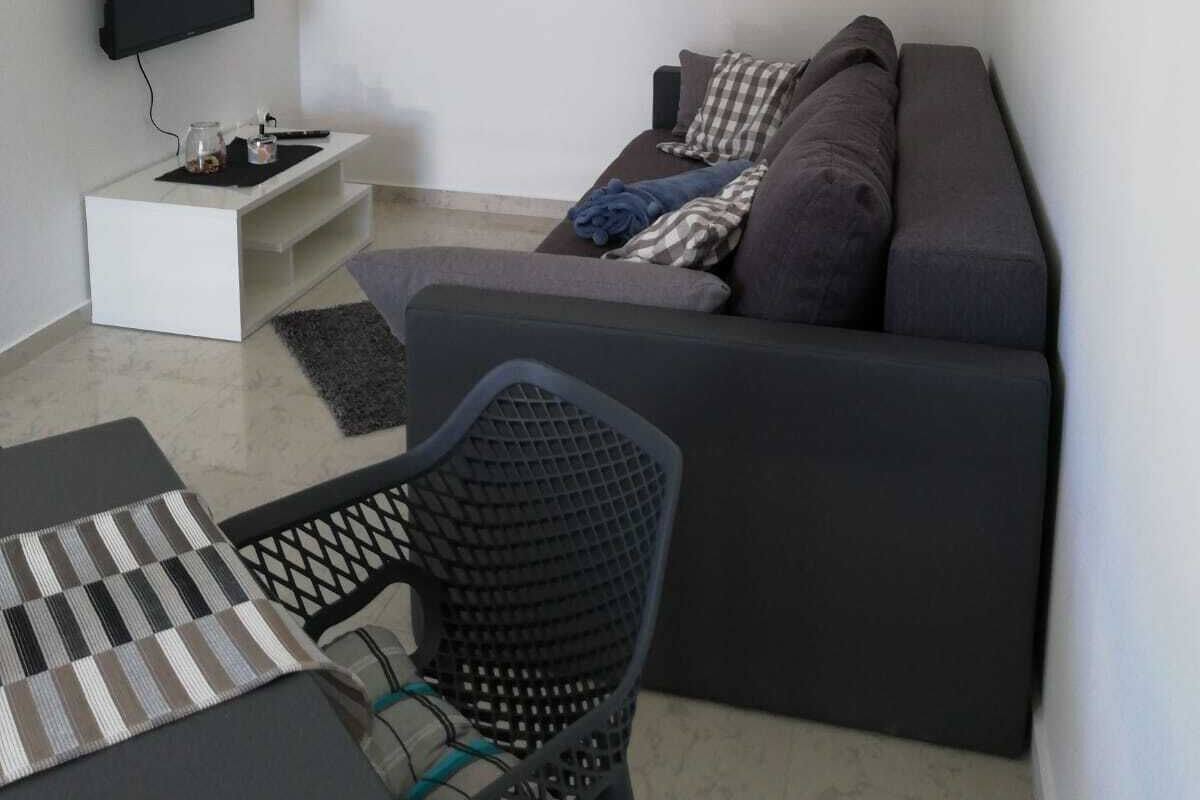 Appartamento Standard | Area soggiorno | TV a schermo piatto