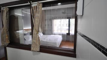 Appartement Deluxe, 2 chambres, 2 salles de bains | 2 chambres, minibar, coffres-forts dans les chambres, rideaux occultants