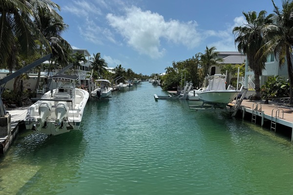 50' wide deep water, flow through canal. 5 minutes to get to open water!