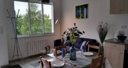 Apartment located on the ground floor of a small residence with four