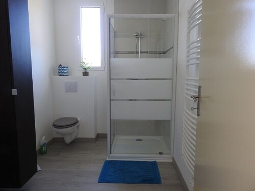 Apartment located on the ground floor of a small residence with four