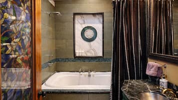 Basic Studio Suite | Bathroom | Hair dryer, towels, soap, shampoo