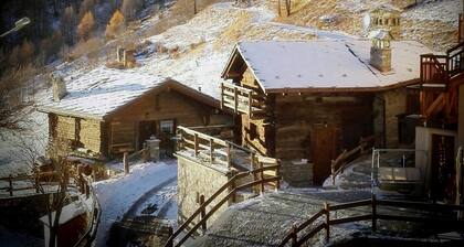 An ancient fairy-tale rascard, a chalet surrounded by nature