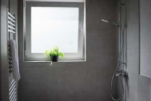 Badkamer met douche