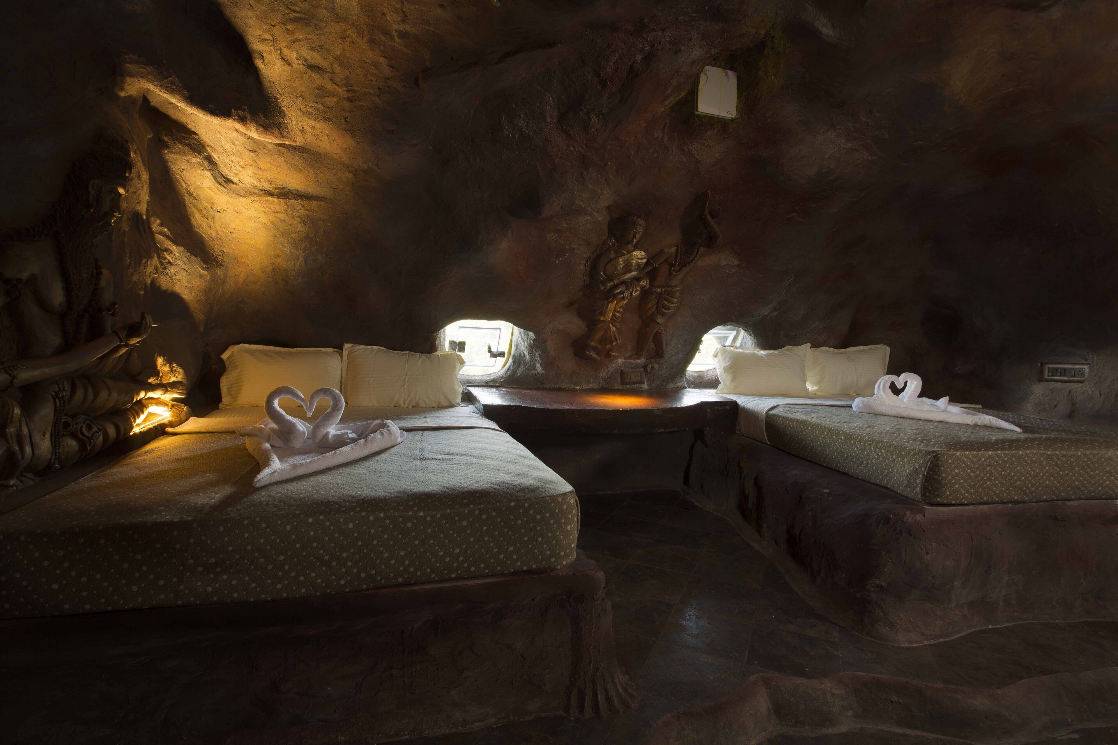 Cave Suites | Premium bedding, down duvets, laptop workspace, iron/ironing board
