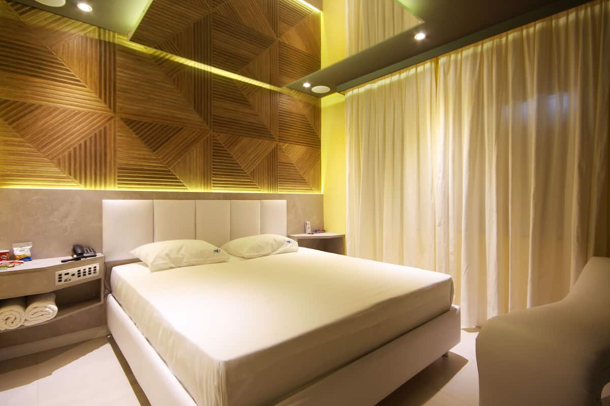 Luxe kamer | Een minibar, een bureau, gratis wifi, beddengoed