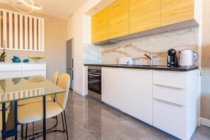 Fridge, microwave, oven, high chair