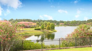 House (Private Screened Splash Pool Overlook) | Property grounds - Private Screened Splash Pool Overlooking Tranquil Lake Right Beside Disney World by Florida Dream Homes (Kissimmee)