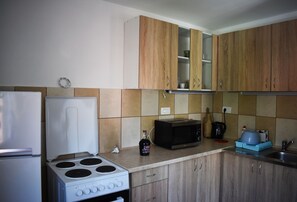 Apartment, 2 Schlafzimmer | Eigene Küche | Kühlschrank, Herdplatte, Wasserkocher, Kochgeschirr/Geschirr/Besteck