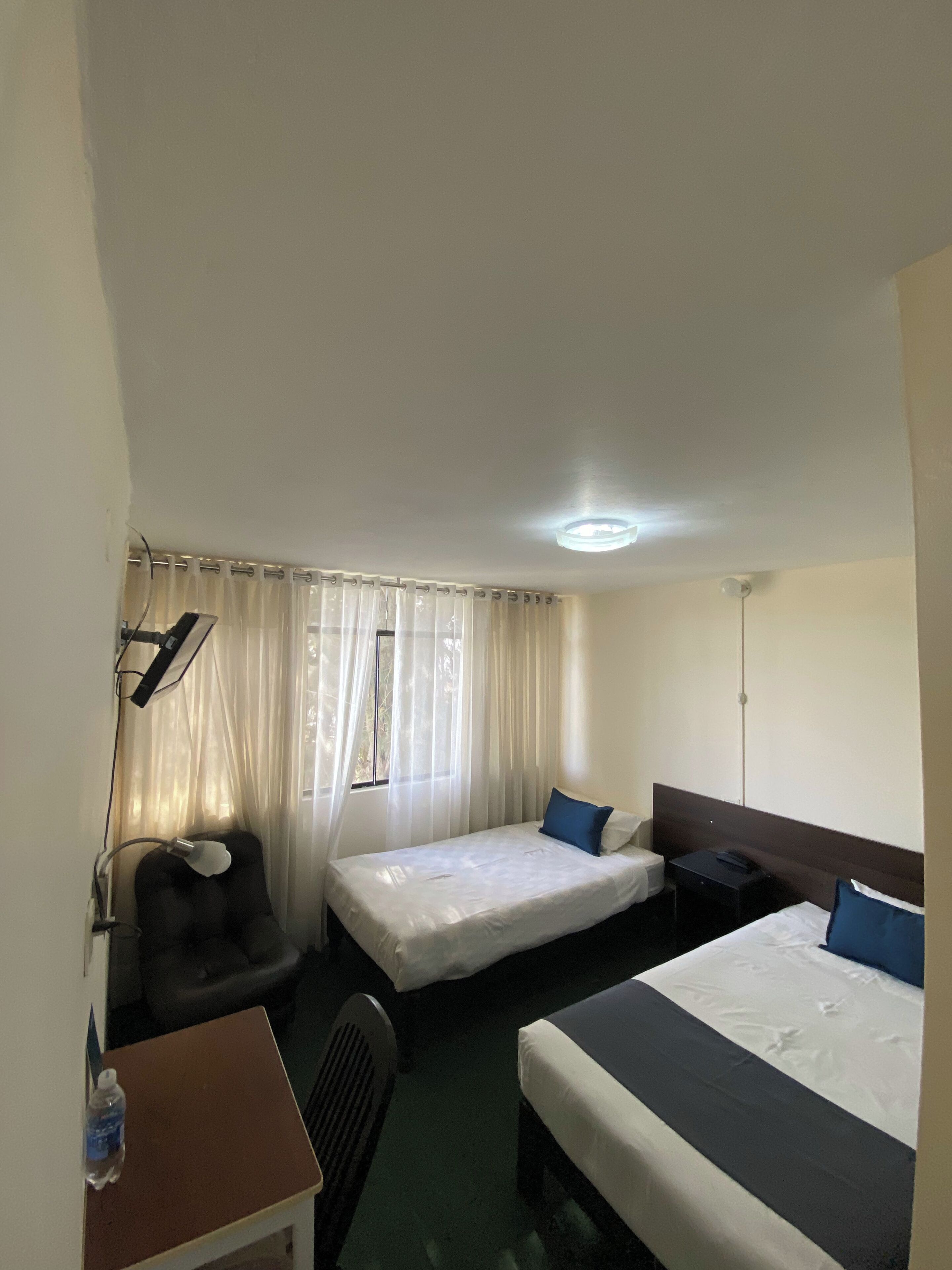 Economy Double Room | In-room safe, desk, laptop workspace, iron/ironing board