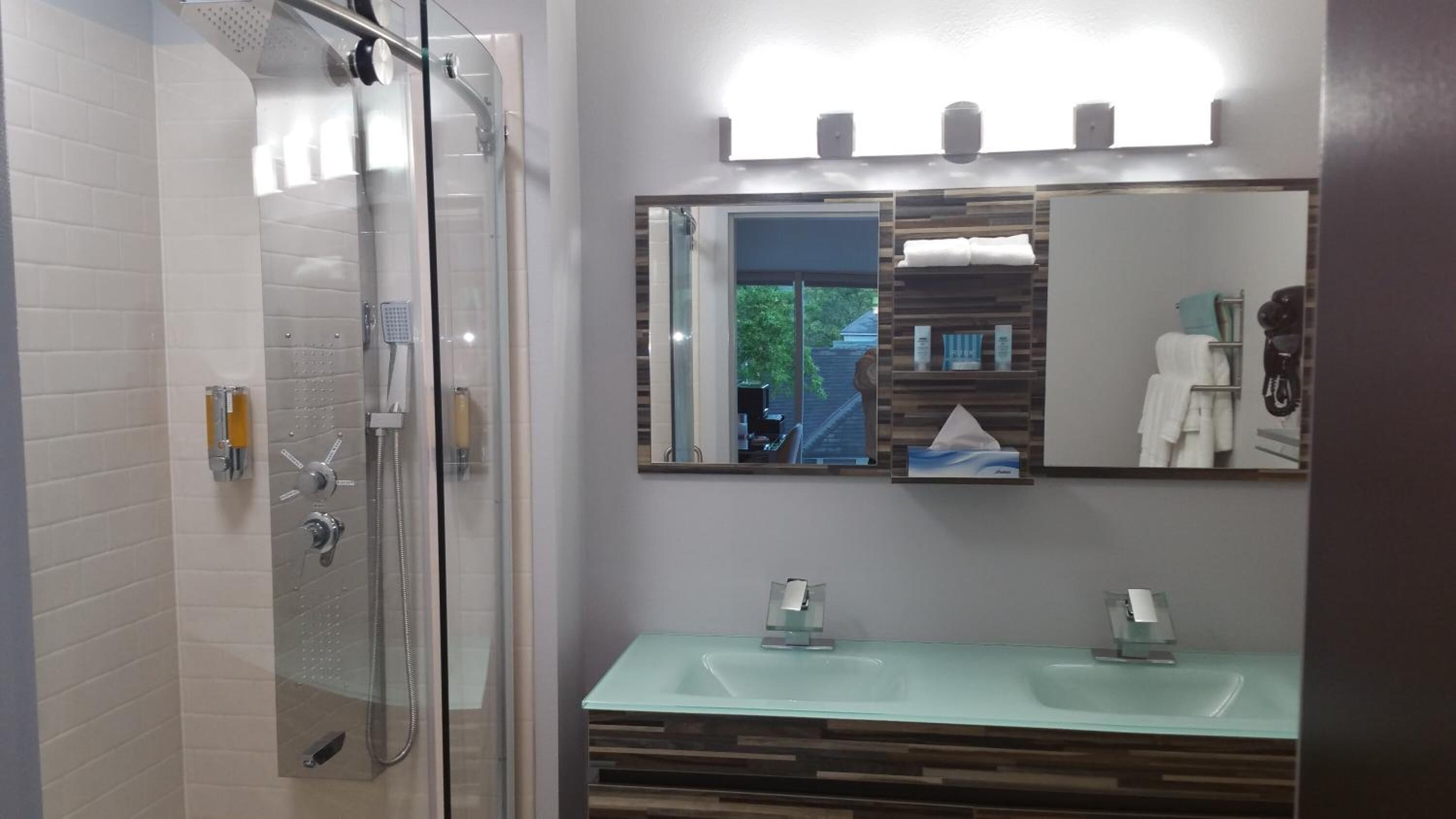 large luxury 2 bedroom suite with livingroom, three 65'' tvs - complimentary drinks - non-smoking | bathroom | shower, hydromassage showerhead, designer toiletries, hair dryer