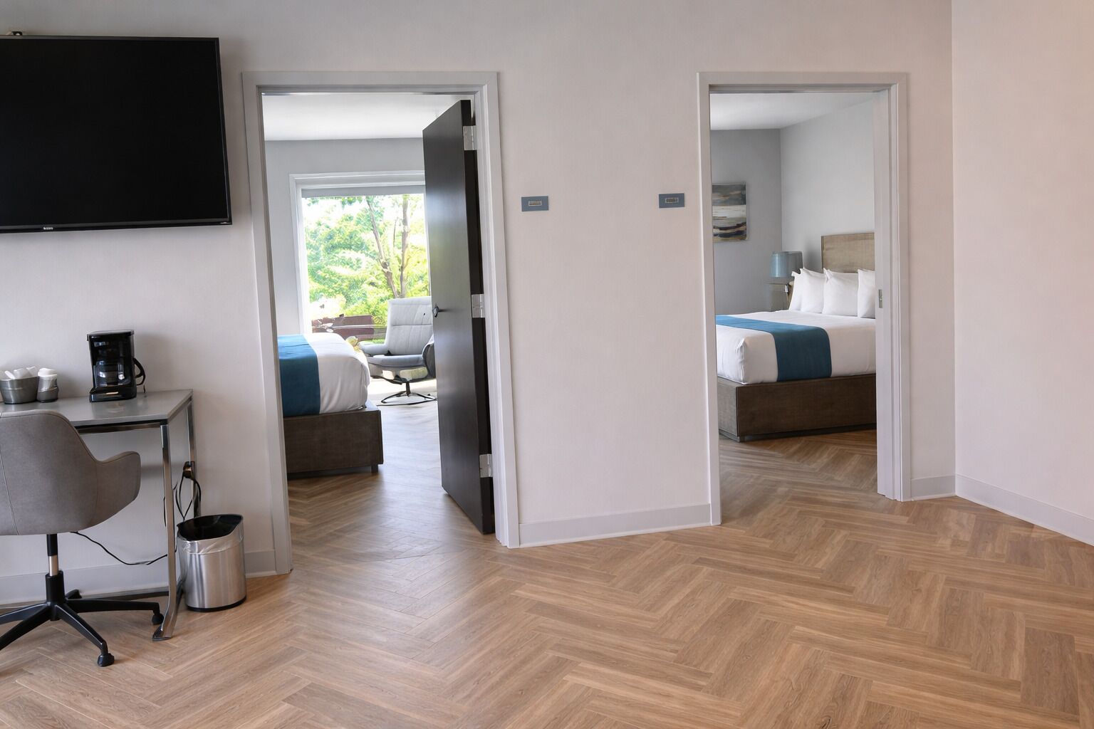 Svit Executive - flera sovrum - kylskåp och mikrovågsugn - utsikt mot staden | Egyptiska bomullslakan, sängtillbehör av högsta kvalitet och duntäcken