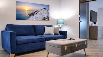 Luxury Suite - Bedroom w/ King Bed and 65'' TV and Livingroom with Sofa Queen Bed and another 65' TV | Living area