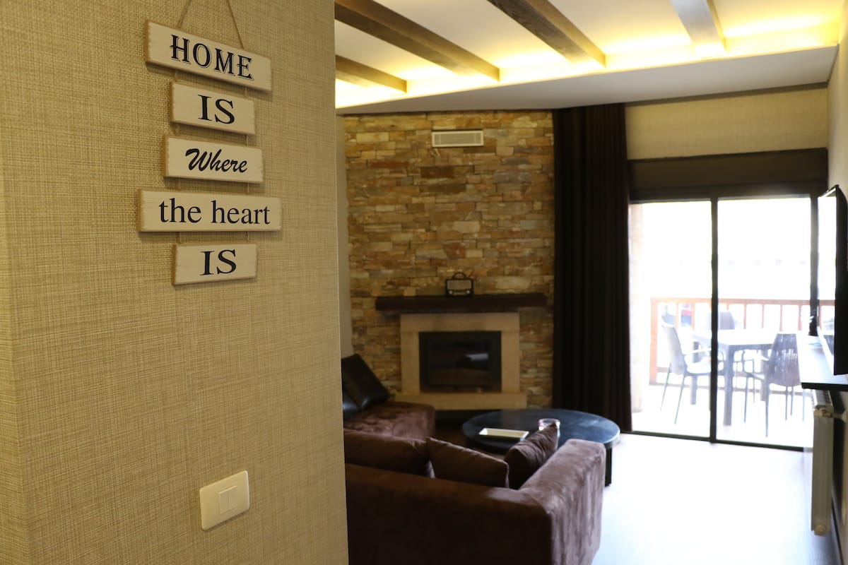Flat-screen TV, fireplace