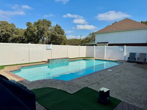 Outdoor pool, a heated pool - Home Hidden In Plain Sight with HEATED Pool and Hot-Tub (San Antonio)