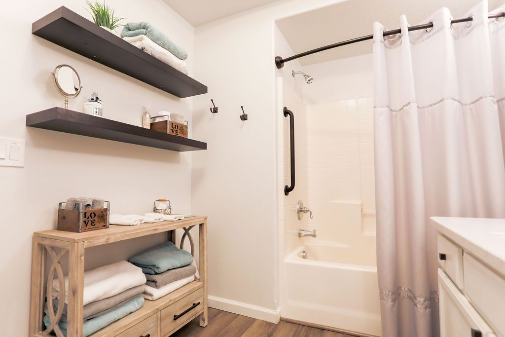 Combined shower/tub, hair dryer, towels, soap