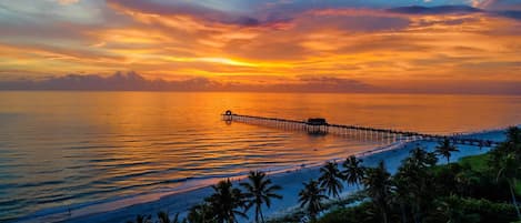 On the beach, sun-loungers, beach towels