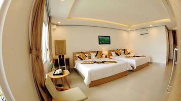 Standard Quadruple Room | Premium bedding, minibar, in-room safe, desk