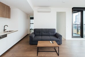 City Apartment, 2 Bedrooms, 2 Bathrooms | Living room | TV