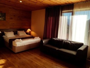 Suite | Tabla de planchar con plancha, wifi gratis, ropa de cama