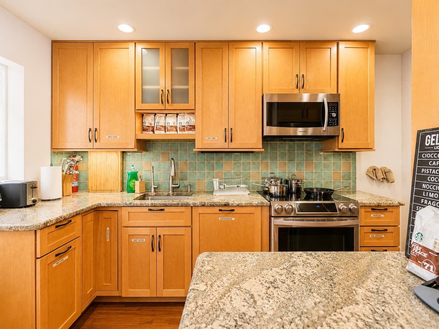 Coffee/tea maker, fridge, microwave, oven
