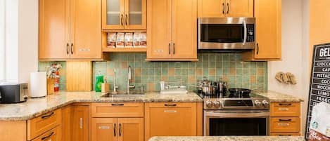 Coffee/tea maker, fridge, microwave, oven