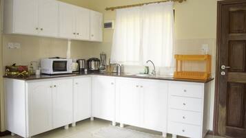 Apartment | Private kitchen | Fridge, microwave, oven, stovetop
