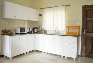 Apartment | Private kitchen | Fridge, microwave, oven, stovetop