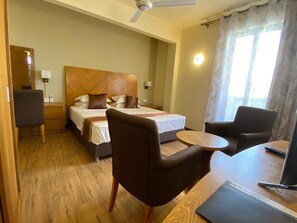 In-room safe, desk, laptop workspace, blackout drapes - The Monalysa Suites & Residence (Grand-Baie)