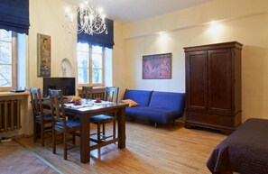 Estudio Deluxe | Área de sala de estar