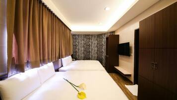 Chambre Quadruple Économique | Bureau, rideaux occultants, chambres insonorisées, Wi-Fi gratuit