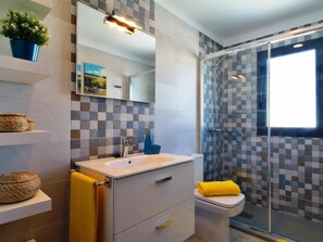 Bathtub, hair dryer, towels