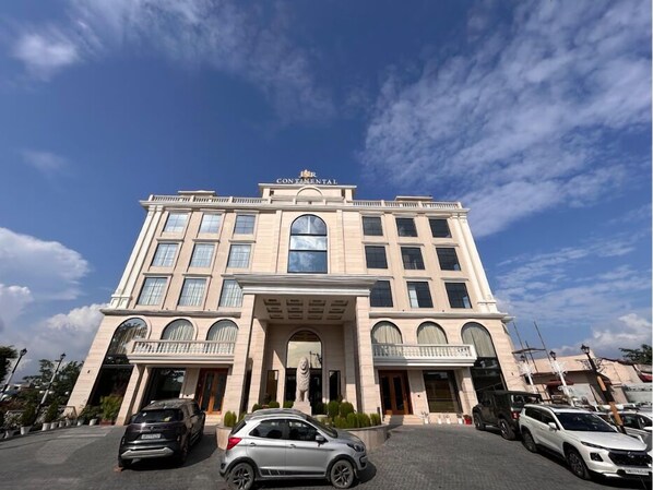 A large, multi-story hotel with a prominent 'Continental' sign at the top. - Hotel JSR Continental (Dehradun)