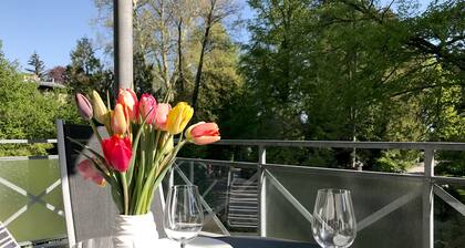 Seeglück vacation apartment - high-quality apartment in the villa district with south-facing balcony