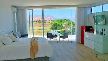 Grand Studio Suite, Sea View, Beachfront | Premium bedding, down comforters, minibar, in-room safe