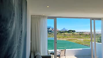 Signature Studio Suite, Sea View, Beachfront | Premium bedding, down comforters, minibar, in-room safe