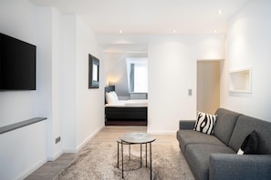 Junior Suite, 1 Queen Bed | Hypo-allergenic bedding, individually decorated, blackout drapes