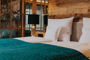 Suite estudio exclusiva | Ropa de cama hipoalergénica, minibar, caja fuerte y escritorio