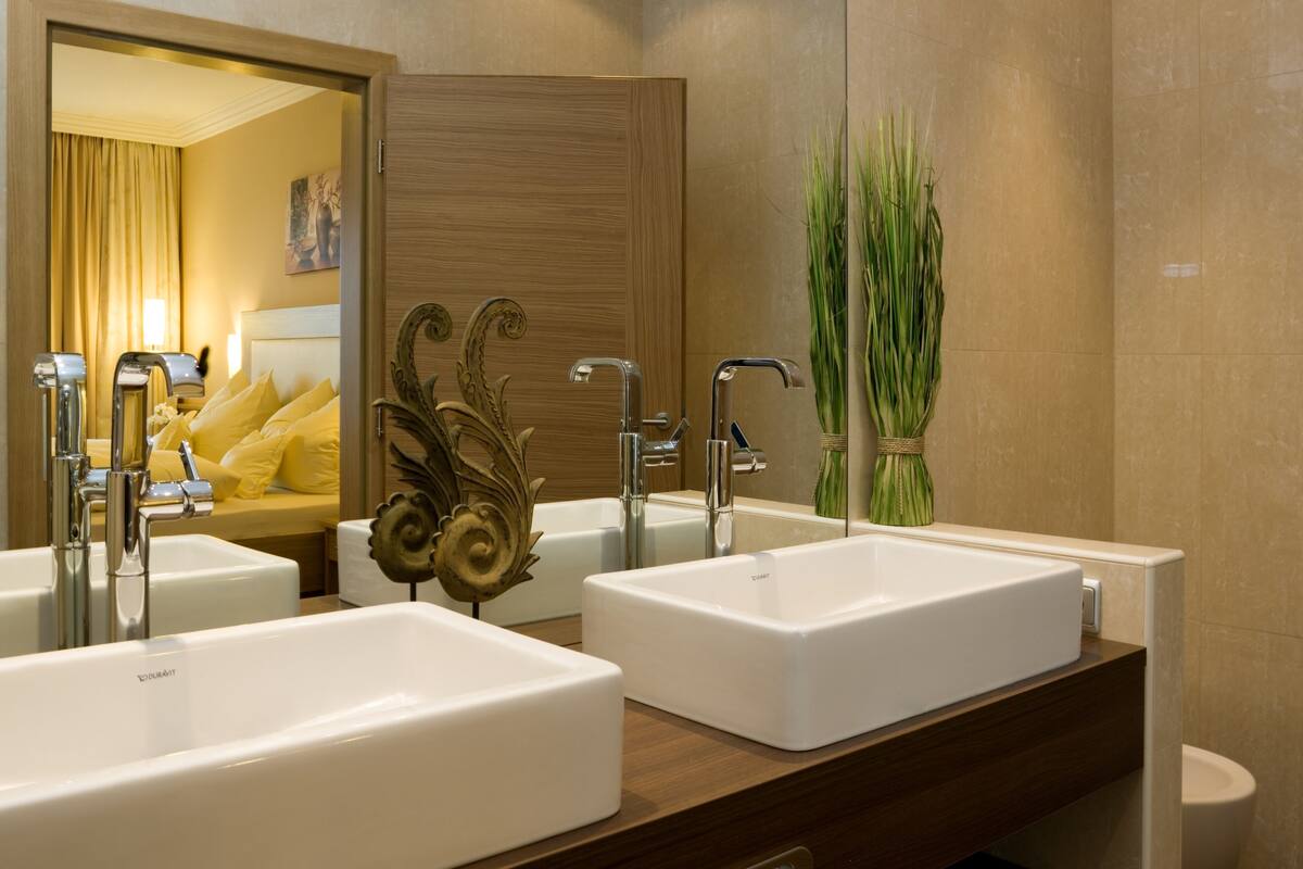 premium suite | bathroom | free toiletries, hair dryer, bathrobes, slippers