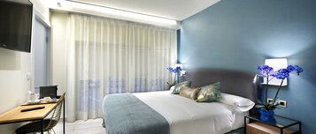 Deluxe Queen Room (Verde Cobre) | Down comforters, Select Comfort beds, in-room safe