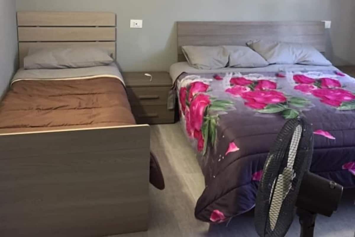 Triple Room | Hypo-allergenic bedding available, down comforters, blackout drapes