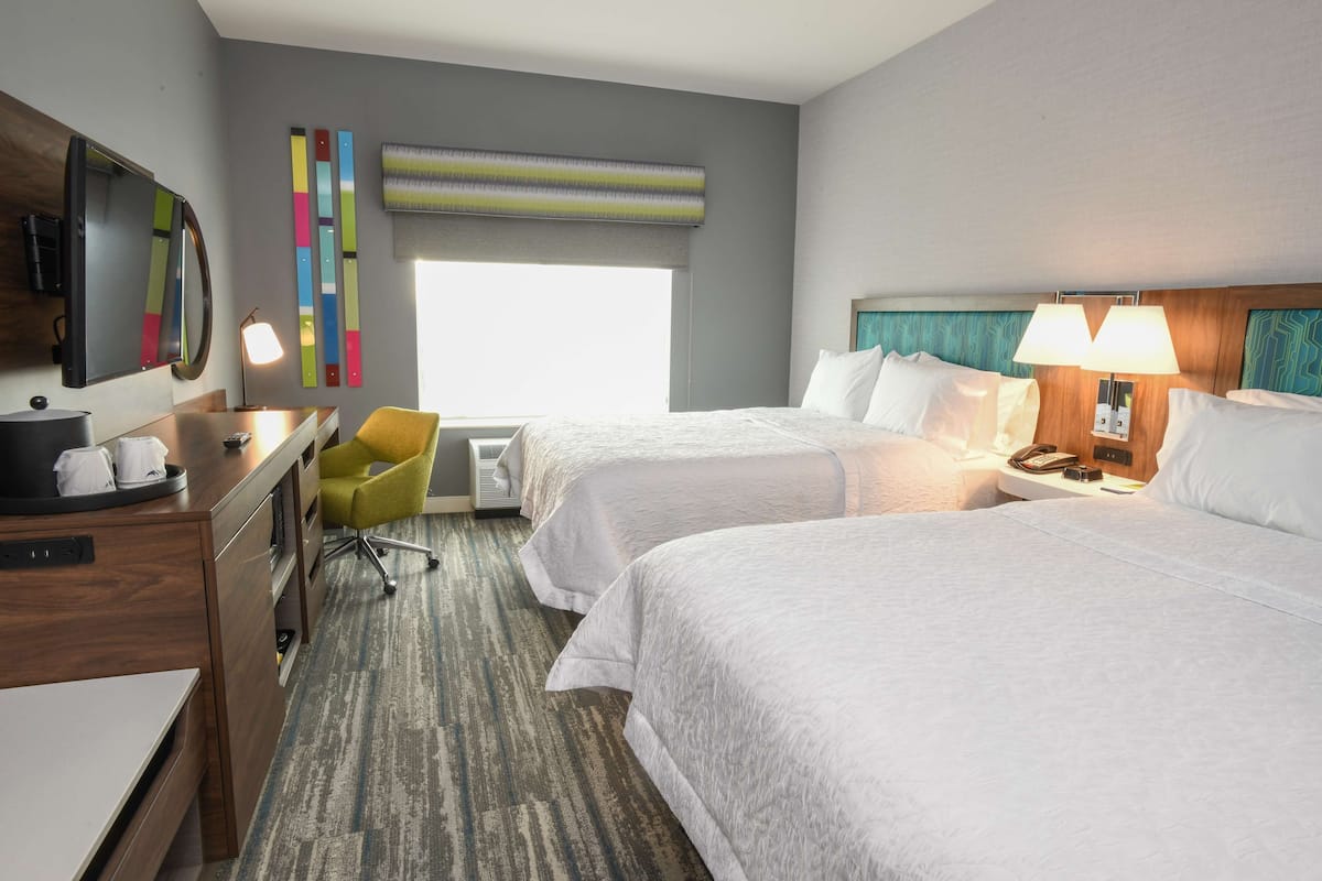Room, 2 Queen Beds, Refrigerator | In-room safe, desk, laptop workspace, blackout drapes