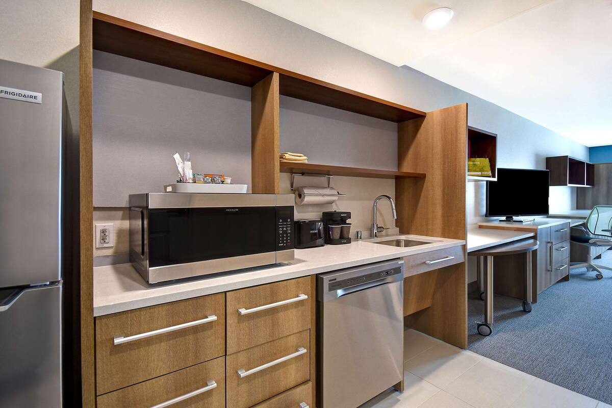 full-sized fridge, microwave, dishwasher, coffee/tea maker