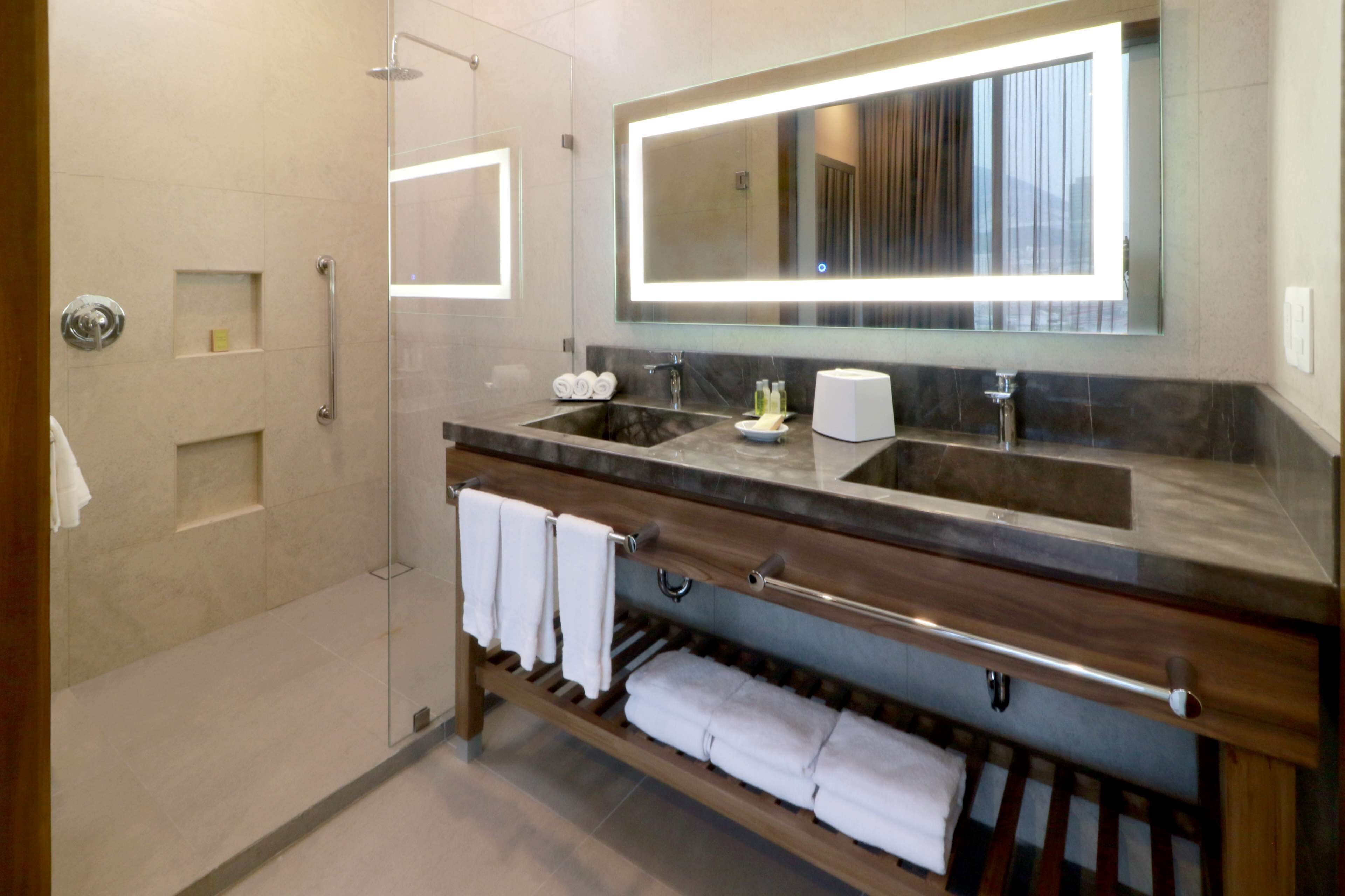 junior suite, 1 queen bed | bathroom | shower, rainfall showerhead, free toiletries, hair dryer