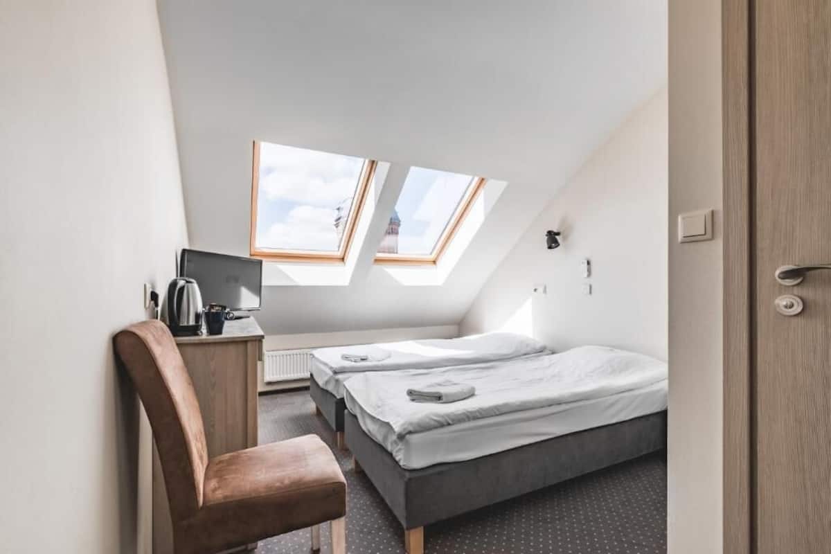 Economy Twin Room | Blackout drapes, iron/ironing board, free WiFi