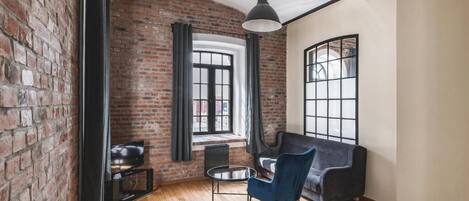 Appartement Confort | Coin séjour | Télévision