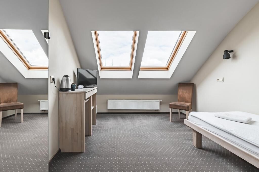 Economy Single Room | Blackout drapes, iron/ironing board, free WiFi