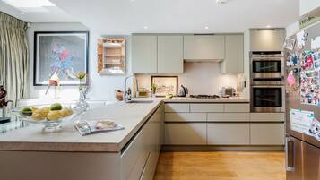 Two-Bedroom House | Private kitchen | Coffee/tea maker, full-sized fridge, microwave, stovetop